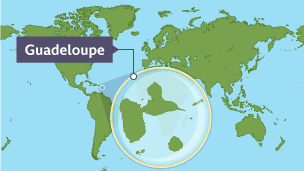 A map of the world with Guadeloupe magnified and labelled